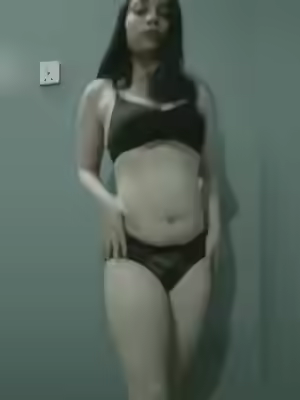 Cute Girl Displays Her Figure in Bathroom